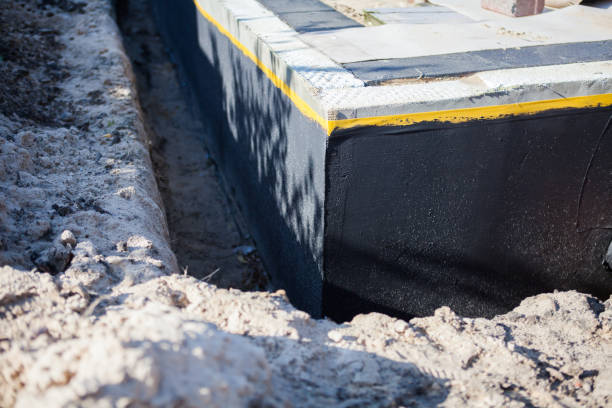 Professional Waterproofing technician working in Childersburg, AL